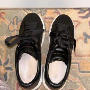 Barely worn Alexander mcqueens! I would say it fits women 10-11